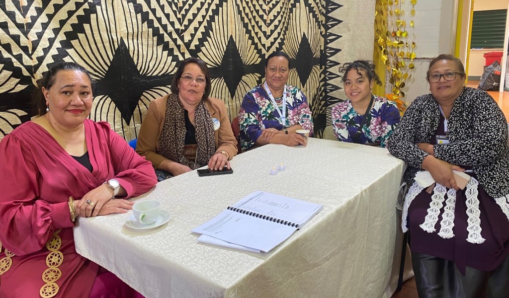 Conference Tongan women back hall